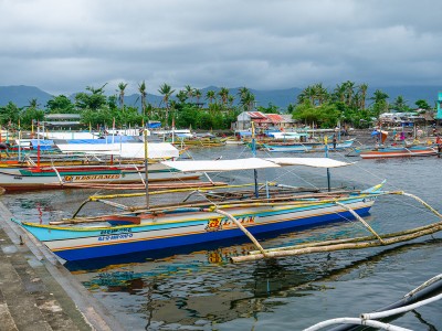 An image of boats docked in a bay in the Philippines